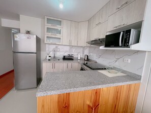 Private kitchen - Cozy 2-bedroom apartment in Cusco, near the city center. (Cusco)