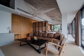 Luxury Suite, Patio, Lake View | Living room | LCD TV