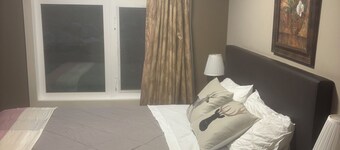 Affordable queen bedroom in Windtower Lodge