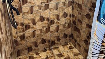 Shower, towels, soap, toilet paper