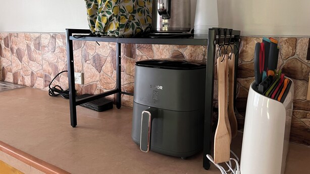A kitchen counter with a coffee maker, a kettle, and a knife holder. - Mareva Kore Unit 1 (Avarua)