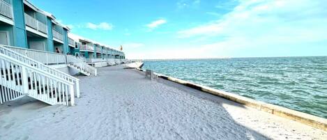 On the beach, sun loungers, beach towels