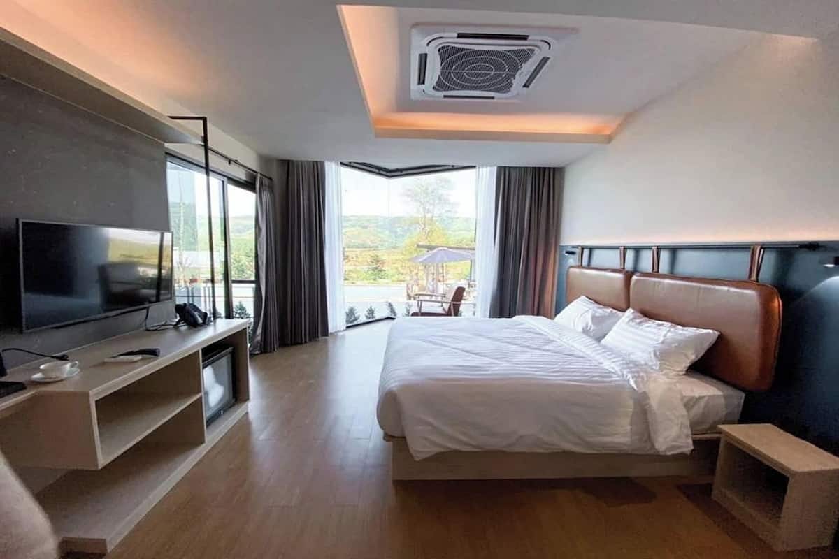 Doppia Deluxe | Minibar, una cassaforte in camera, una scrivania, Wi-Fi gratuito