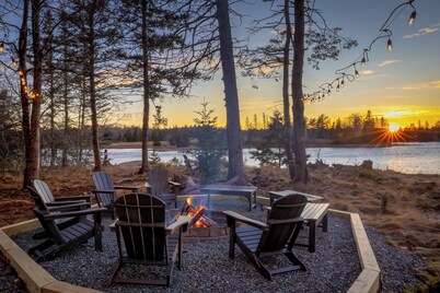 Oceanfront, modern + mobility-minded home with hot tub, fire pit and game room