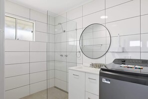 Shower, hair dryer, towels