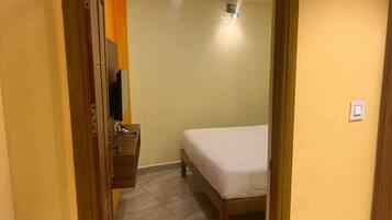 Suite familiar | Ropa de cama hipoalergénica, escritorio, wifi gratis y ropa de cama