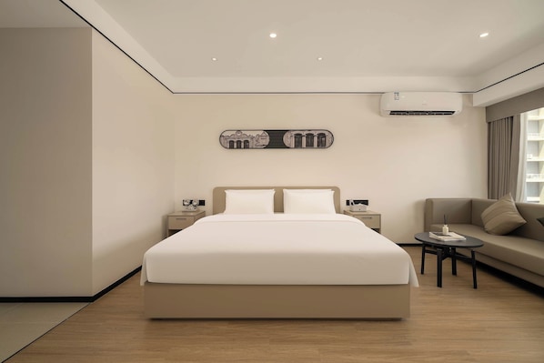 Superior Double Room, City View | Living area | TV - Dahua Group Xinn Hotel (Haikou)