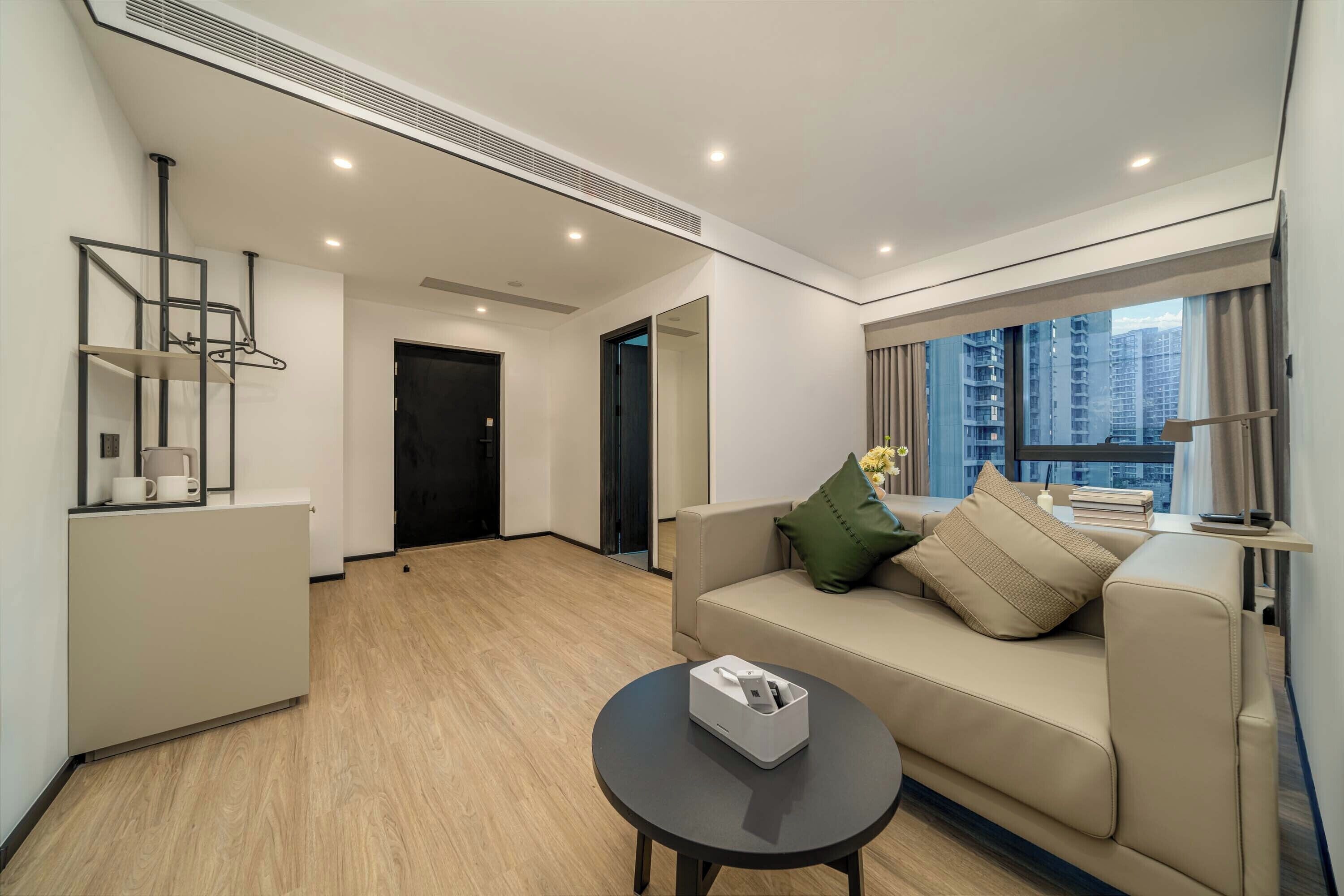 Luxury Suite, City View | Desk, laptop workspace, blackout drapes, free WiFi