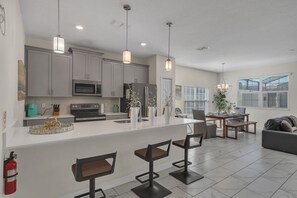 Private kitchen - Three Themed Worlds. One Unforgettable Family Stay. (Kissimmee)