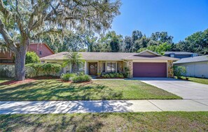 Exterior - Spacious 4-bedroom house in quaint Tampa with AC (Tampa)