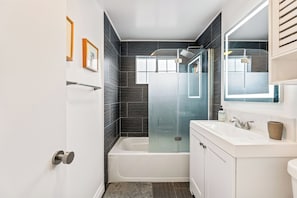 Shower, hair dryer, towels, soap - Hollywood Hills Retreat • Hot Tub & City Views (Los Angeles)