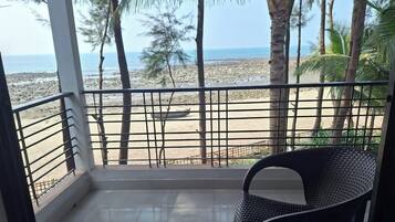 Dobbelt- eller tomannsrom – deluxe, strandutsikt | Oppholdsområde