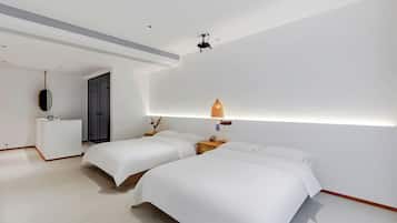 Premium bedding, down duvets, individually decorated