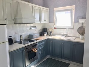 Fridge, microwave, oven, cookware/dishes/utensils