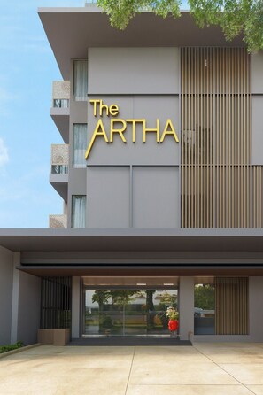 A modern building with a sign reading "The ARTHA". - The Artha - Bandung (Bandung)