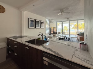 Private kitchen - Spacious, bright, and airy oceanfront 3-bedroom apartment in serene Luquillo (Luquillo)