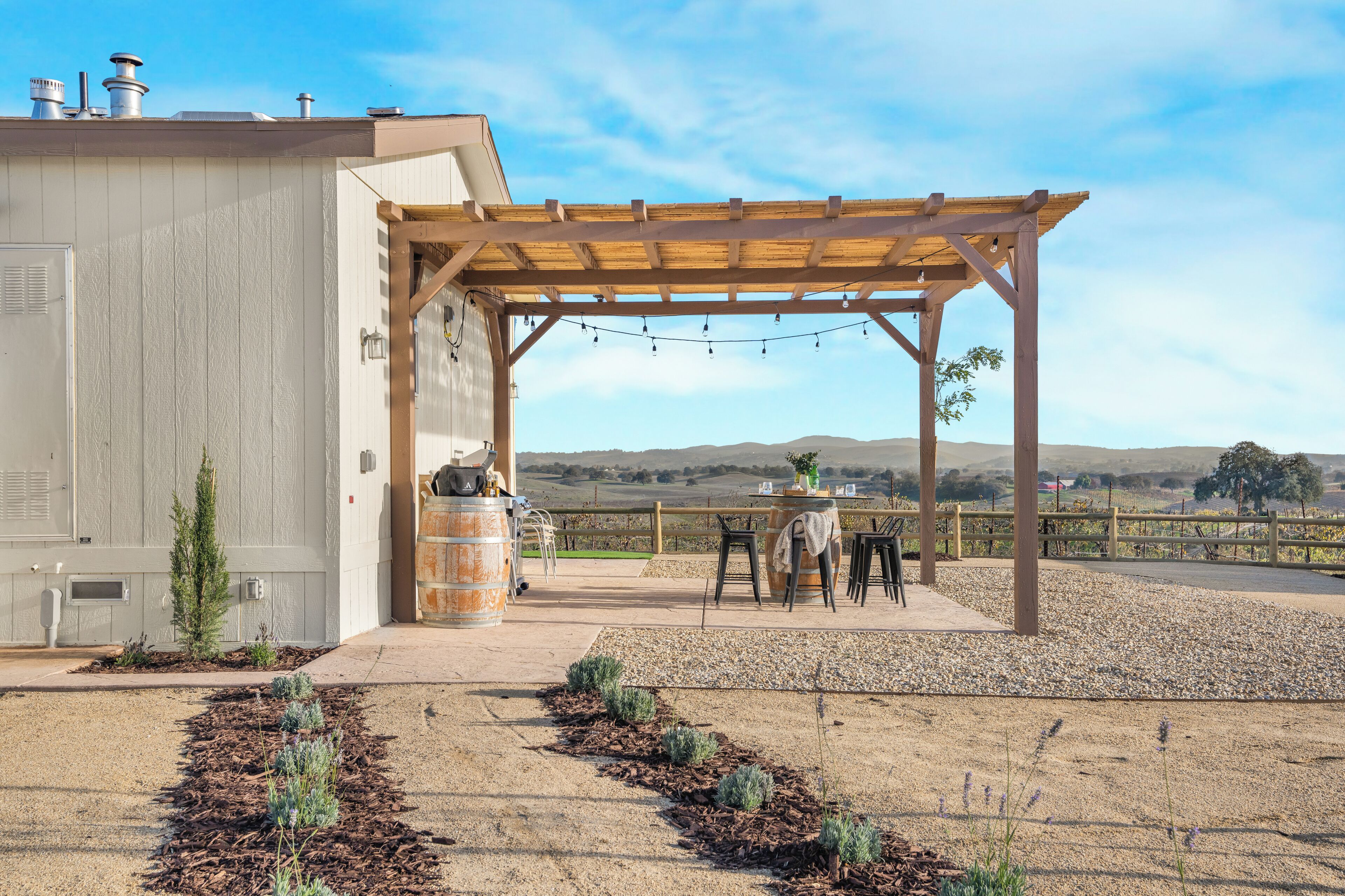 Peaceful pergola patio overlooking rolling Paso Robles hills.