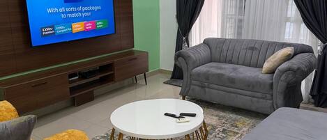 Deluxe Apartment, Balcony, City View | Living area