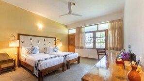 Premier-Doppel- oder -Zweibettzimmer | Wohnbereich