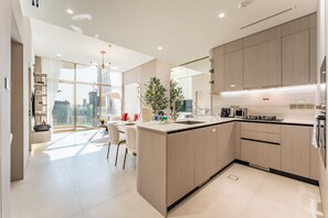 Fridge, microwave, oven, stovetop - Pear House II BY Imtiaz 1014 by Deluxe Holiday Homes (Dubai)
