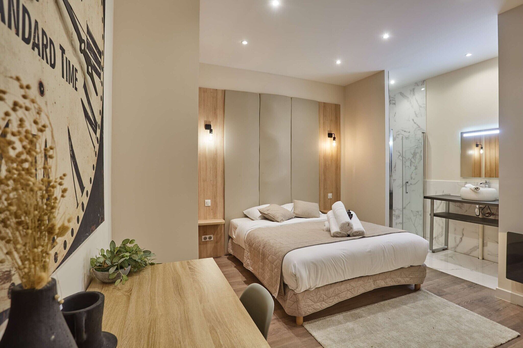 Desk, iron/ironing board, bed sheets