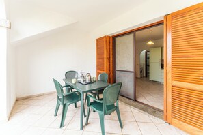 Apartment, 1 Bedroom, Balcony, Garden View | Dining room - Bright Apartment 300mt From the Beach (Budoni)