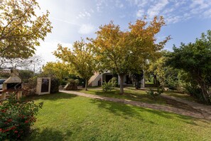 Apartment, 2 Bedrooms, Patio, Garden View | Garden - Spacious Flat 300mt From the Beach (Budoni)