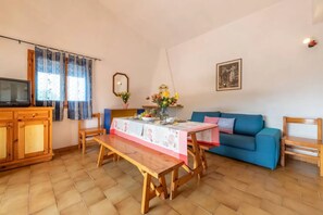 Apartment, 1 Bedroom, Patio, Garden View | Living room - Cozy Apartment 150m From Pittulongu Beach (Olbia)