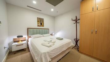 Superior Condo, Balcony | Iron/ironing board, free WiFi