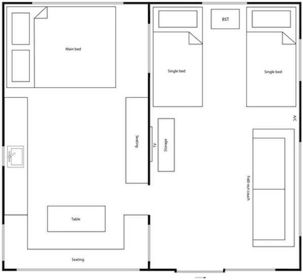 A hotel room layout with a main bed, two single beds, a TV, storage, a table, and seating area. - Mornington Peninsula Retro Caravans (Rye)