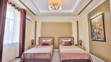 Superior Twin Room, City View | In-room safe, desk, laptop workspace, blackout curtains