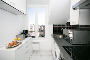 City-lejlighed - 1 dobbeltseng med sovesofa - ikke-ryger - byudsigt | Privat køkken | Kaffe-/temaskine, elkedel, brødrister, højstol