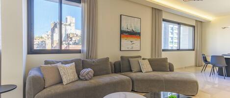 202 | Living room | 65-inch Smart TV with digital channels, Netflix, streaming services