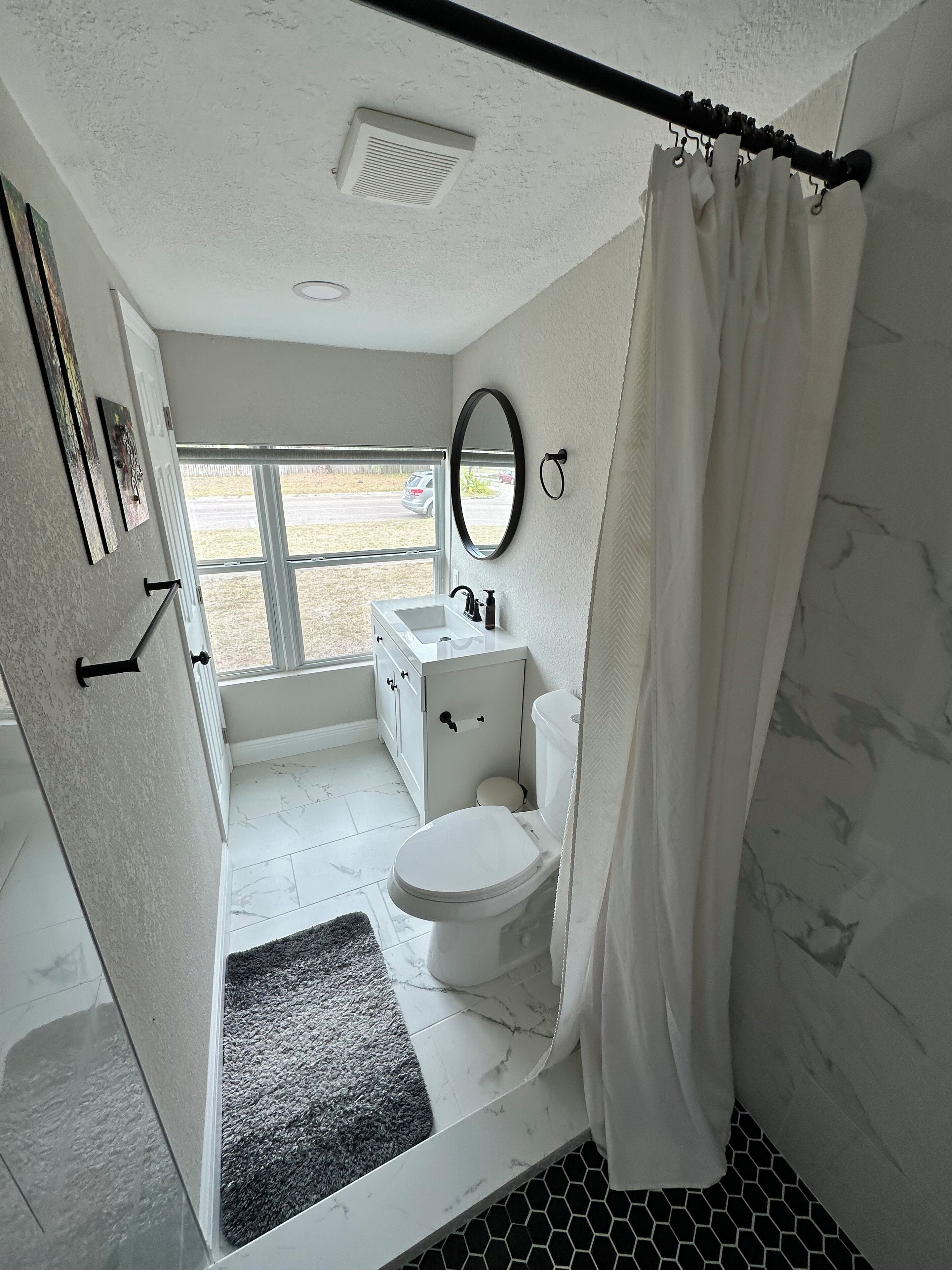 Shower, towels, toilet paper