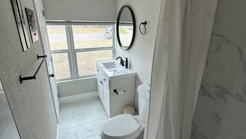 Shower, towels, toilet paper