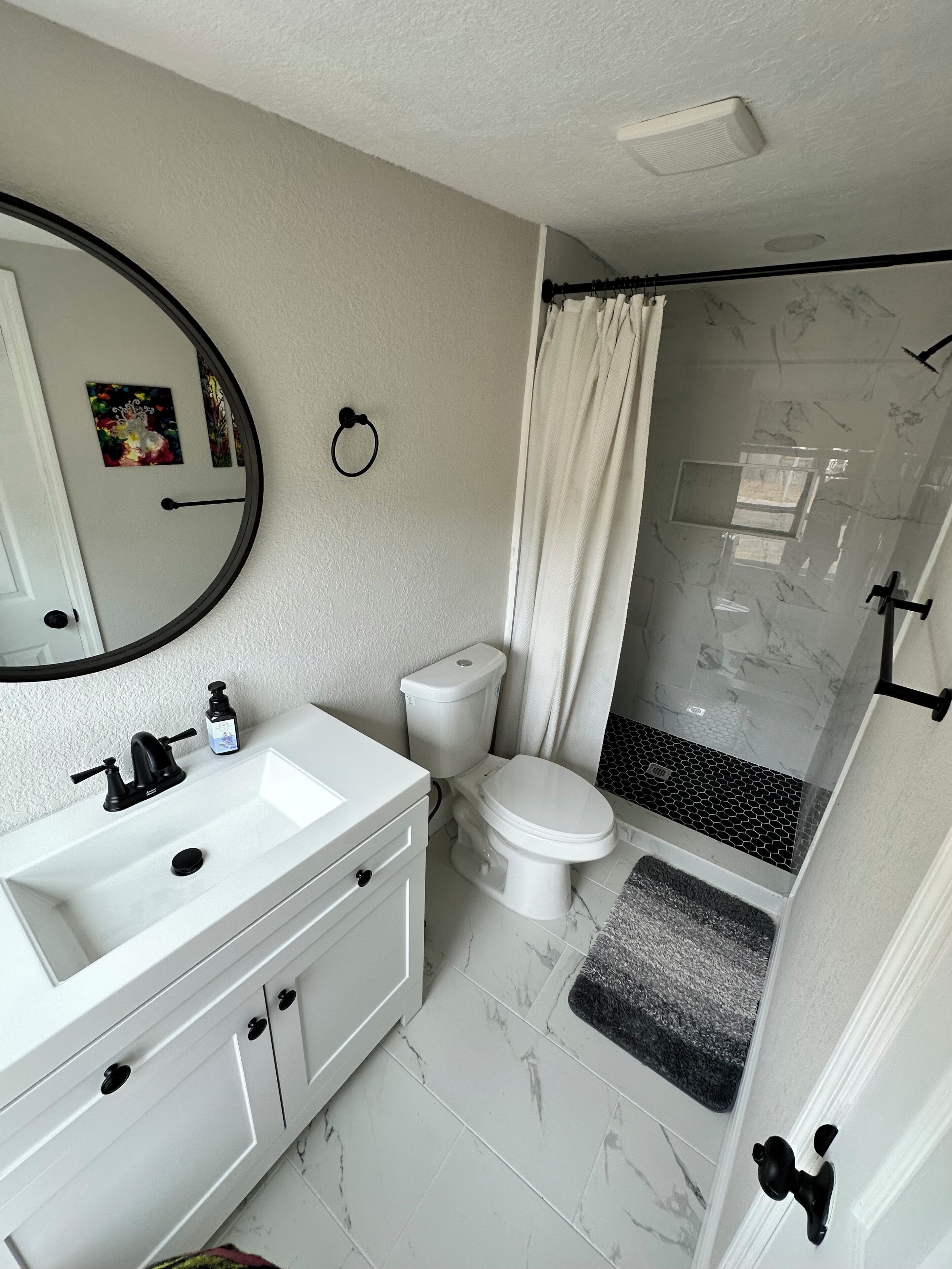 Shower, towels, toilet paper