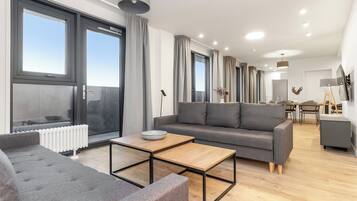 Premium Apartment | Living area | Flat-screen TV