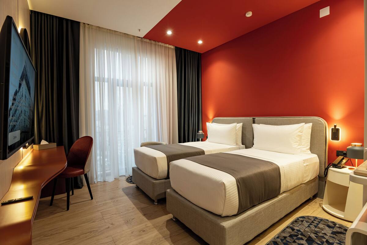 Premium bedding, memory foam beds, minibar, in-room safe