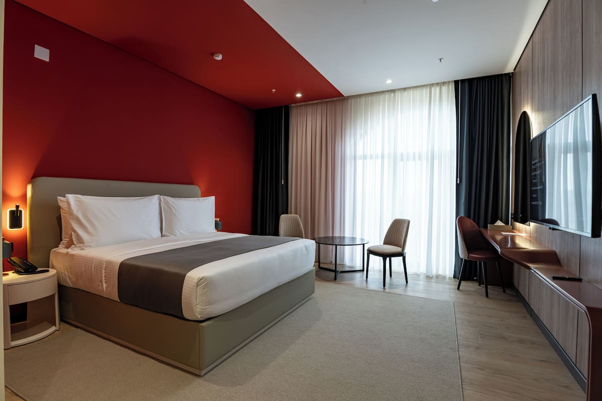 Premium bedding, memory foam beds, minibar, in-room safe