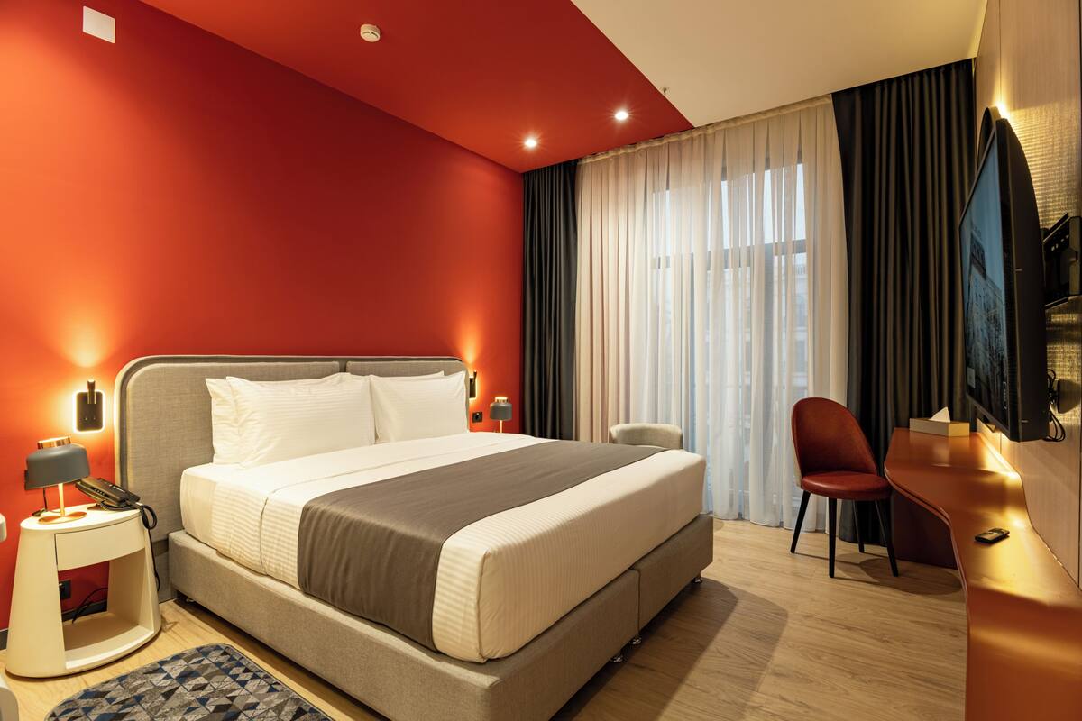Premium bedding, memory foam beds, minibar, in-room safe