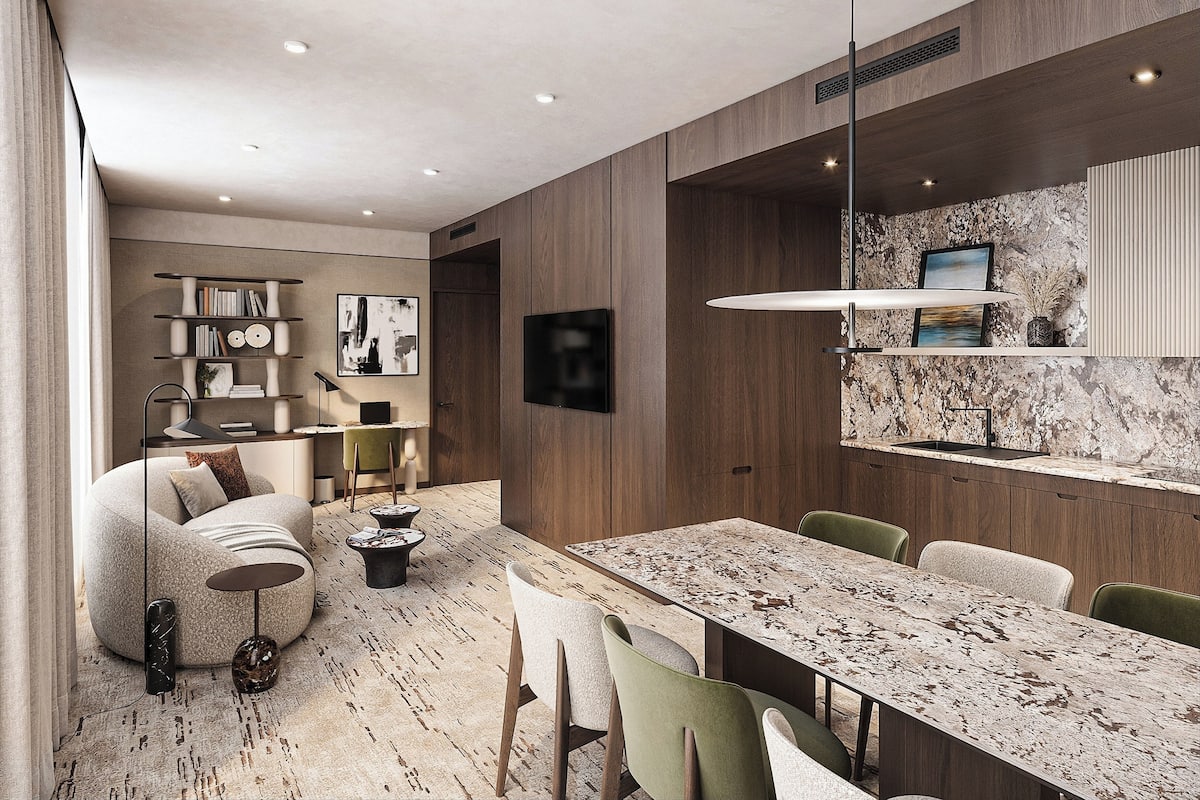 Suite Deluxe, plusieurs lits | Coin séjour