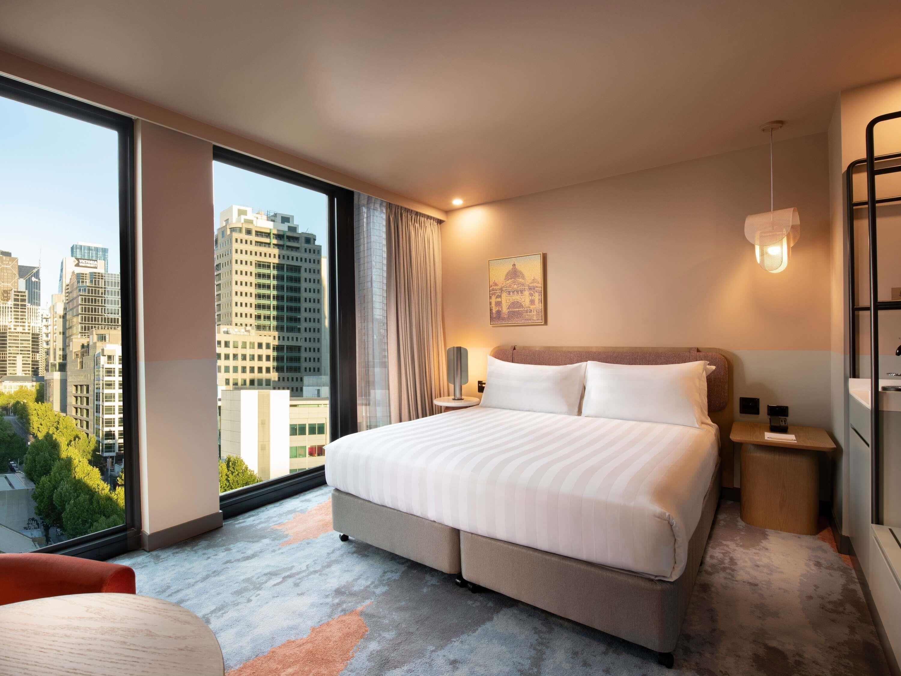 Superior Room, 1 King Bed, City View | In-room safe, laptop workspace, blackout drapes, iron/ironing board