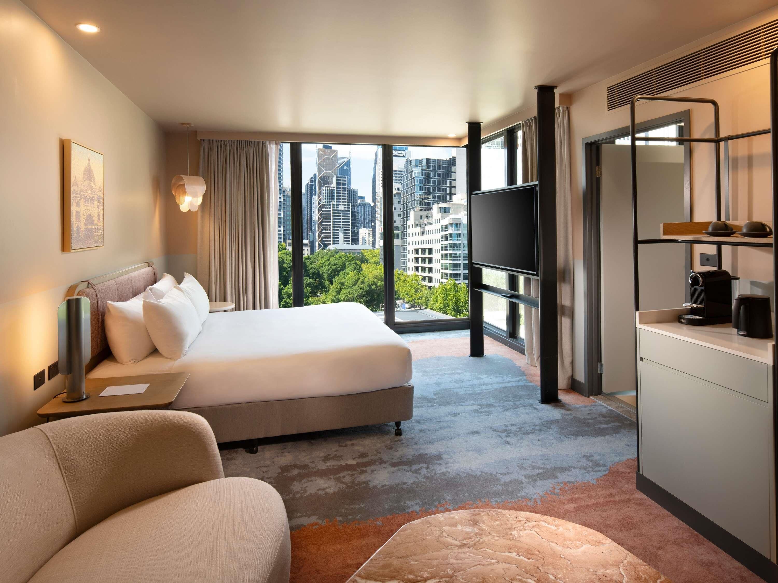 Junior Suite, 1 King Bed | In-room safe, laptop workspace, blackout drapes, iron/ironing board