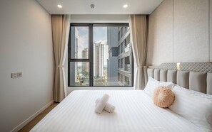 Family Suite, 3 Bedrooms, Club lounge access, City View | Egyptian cotton sheets, premium bedding, down duvets - Elite Luxstay Estella Heights Residence (An Khanh)