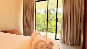 Premium bedding, Select Comfort beds, desk, laptop workspace