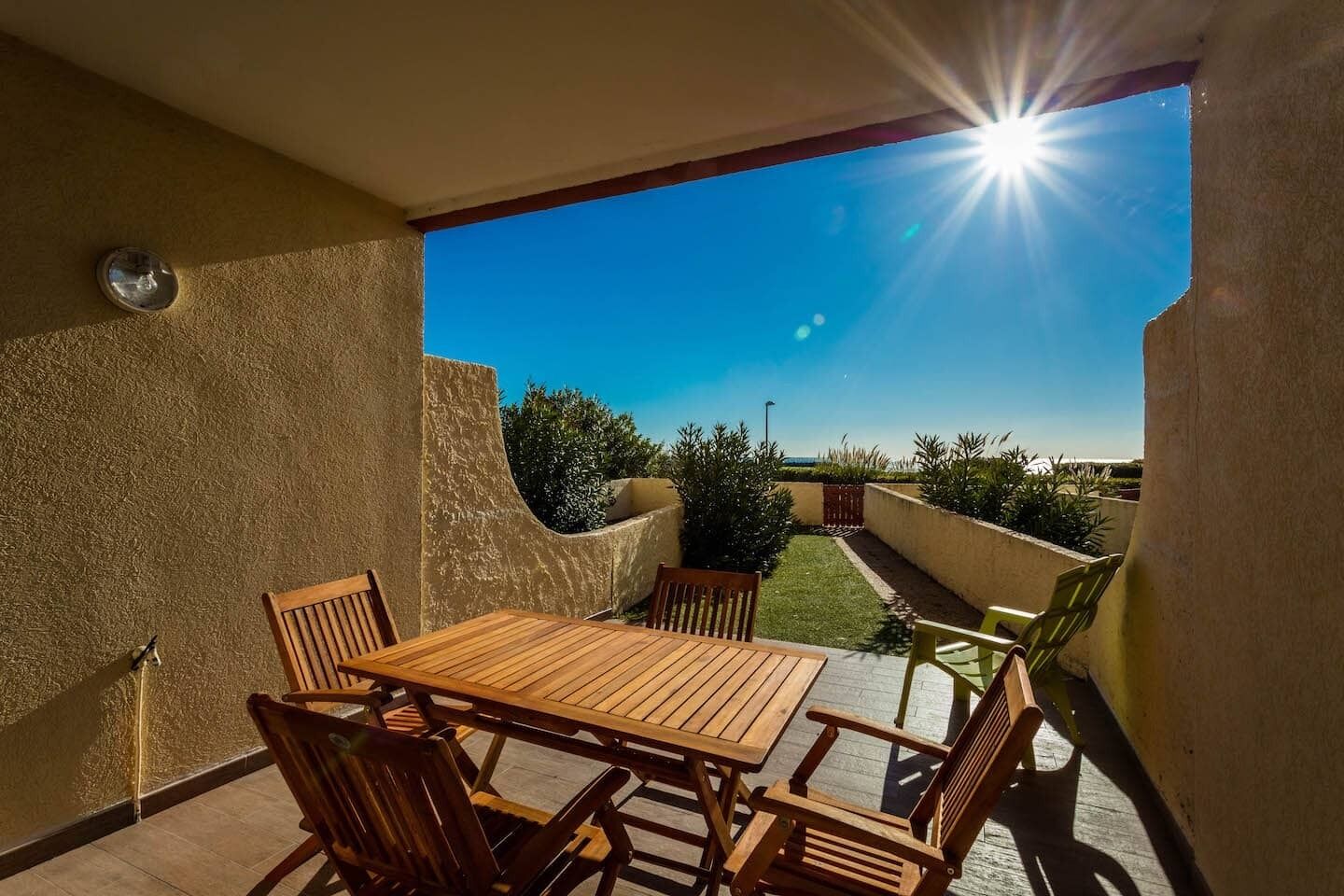 Apartment, Sea View | Living area | LED TV