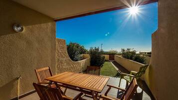 Apartment, Sea View | Living area | LED TV