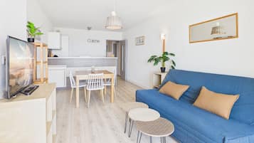 Apartment, Sea View | Living area | LED TV