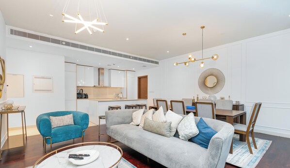 Luxury Apartment, 2 Bedrooms, Pool View | Living area | 55-inch Smart TV with cable channels - 2BR in City Walk with Direct Pool Access (Dubai)