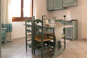 Apartment, 1 Bedroom | Dining room - Apartment With Shared Pool (Orosei)